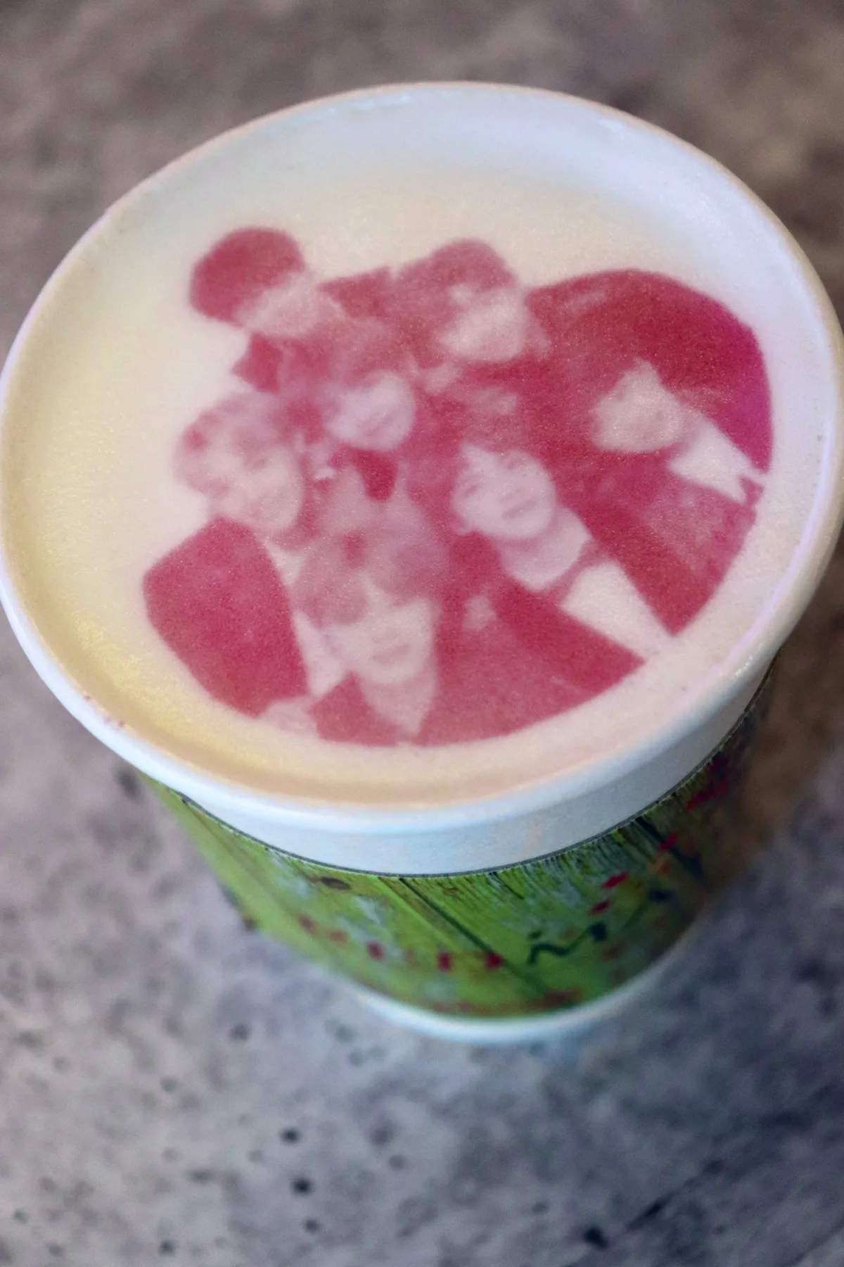 To-go latte with  printed image on the foam