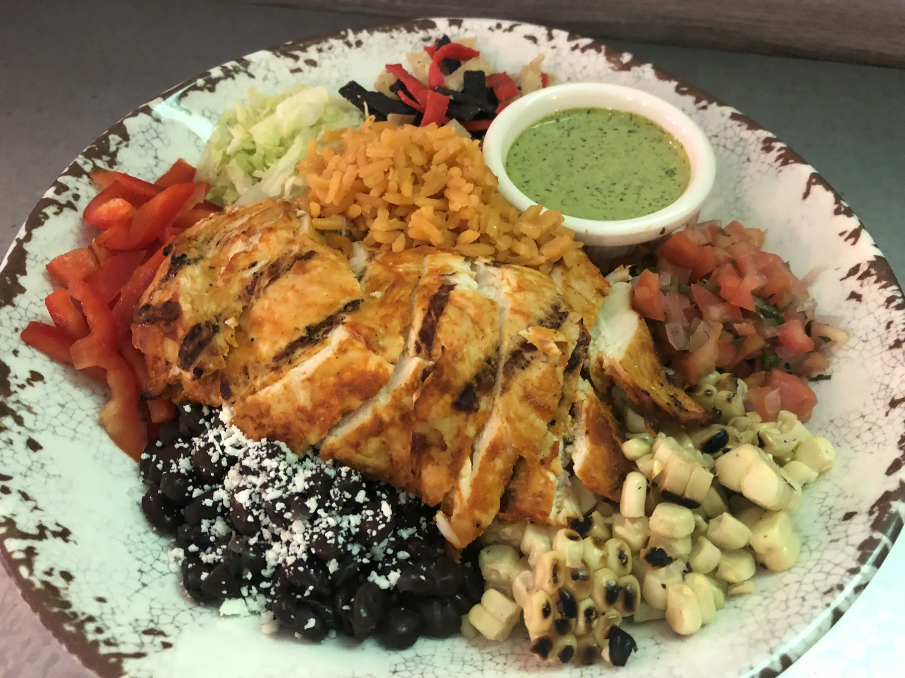 Fiesta bowl with harissa lime chicken